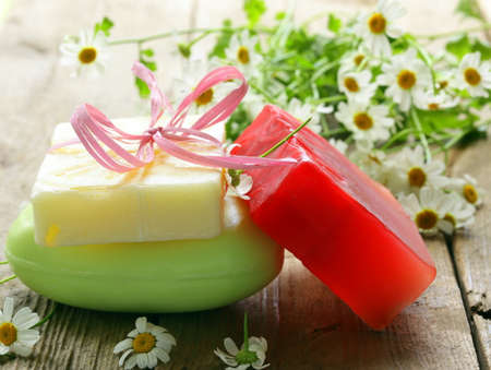 handmade soap with flowers on the organic backgroundの写真素材