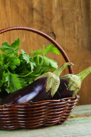 ripe purple eggplant on a wooden backgroundの写真素材