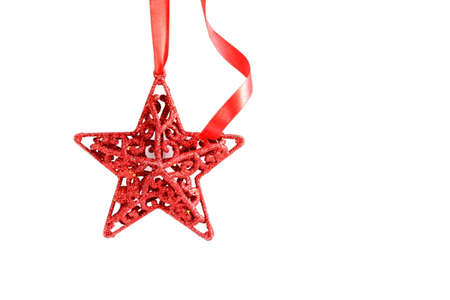 Christmas red star with  ribbon on white background