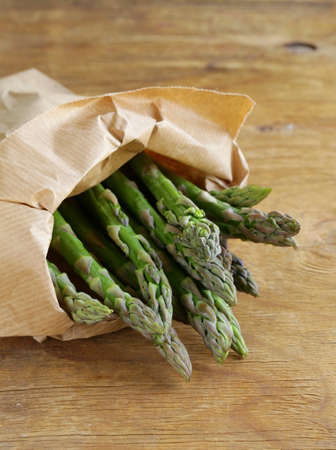 bunch of fresh organic green asparagusの写真素材