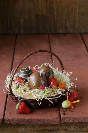 Decorative easter eggs on wooden backgroundの写真素材