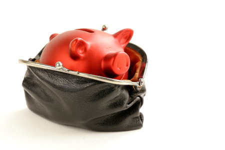 funny red Pig Piggy with old fashioned purse on white backgroundの写真素材