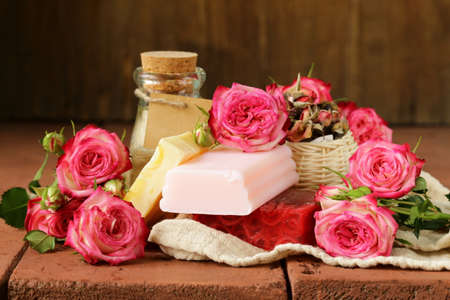 handmade soap with the scent of roses on a wooden tableの写真素材