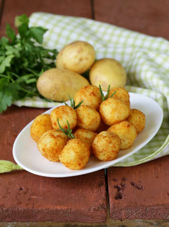 fried potato balls  croquettes  with rosemary