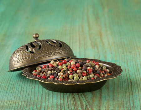 assorted red, black and and white spice pepperの写真素材