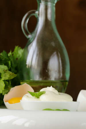 natural egg mayonnaise sauce in a white bowlの写真素材
