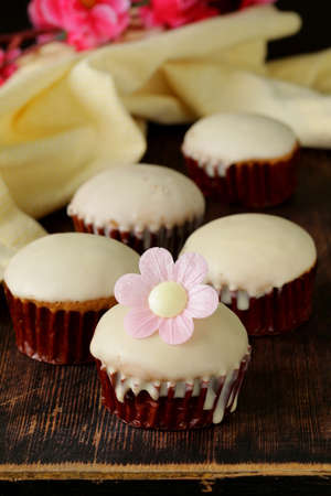 sweet cupcakes with chocolate icing