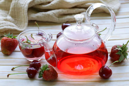 summer fruit tea with a variety of berries  cherry, strawberry の写真素材