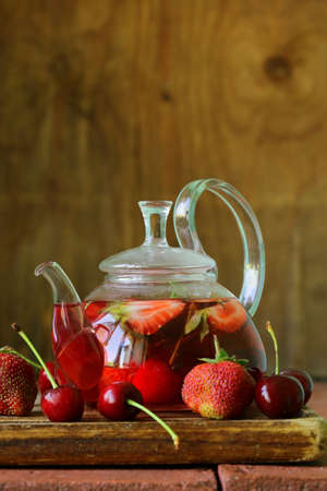 summer fruit tea with a variety of berries  cherry, strawberry の写真素材