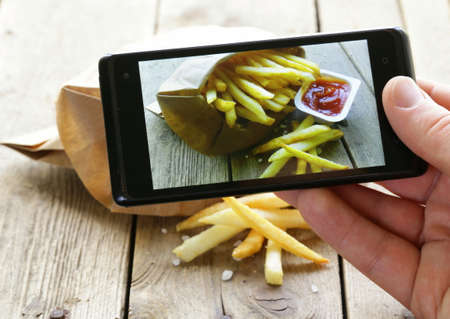smartphone shot food photo - French fries with salt and ketchupの写真素材
