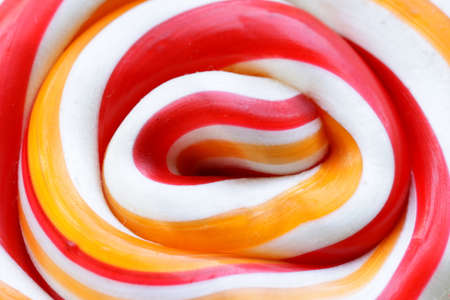 sweet colorful lollipop on a white backgroundの写真素材