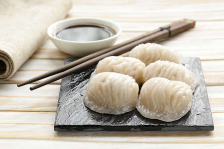 Asian steamed meat dumplings dim sum with soy sauceの写真素材