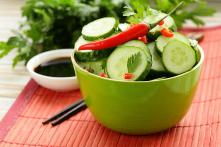 cucumber salad with red chili pepper and cilantro, Asian foodの写真素材