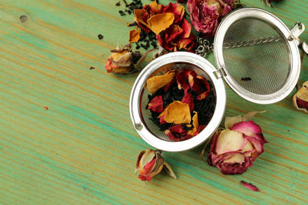 natural organic tea from dry roses on a wooden backgroundの写真素材
