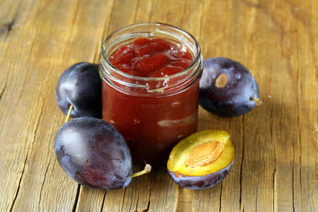 natural organic plum jam with fresh berries