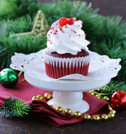 festive red velvet cupcakes Christmas table settingの写真素材