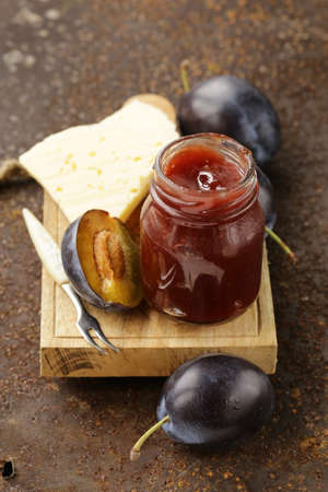 natural organic plum jam with fresh berriesの写真素材