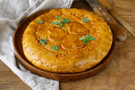 homemade meat pie with potatoes and oreganoの写真素材