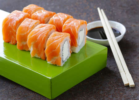 Sushi roll with red salmon and philadelphia cheeseの写真素材