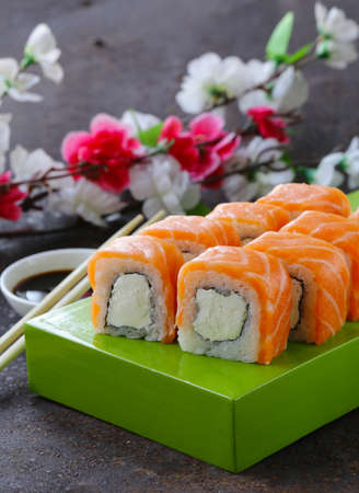 Sushi roll with red salmon and philadelphia cheeseの写真素材