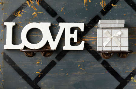 letters \"love\" and gift box, Valentine\'s day conceptの写真素材