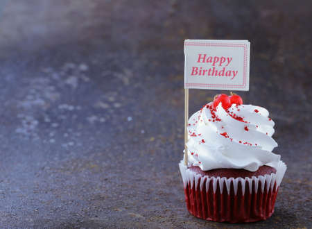 festive red velvet cupcakes with a gift compliment card