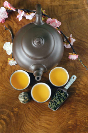 tea set (teapot, cups and different green tea)の写真素材