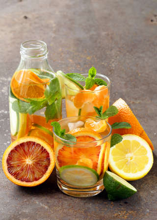 Summer citrus lemonade with orange lime and lemonの写真素材