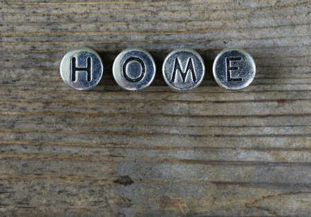 the word "HOME" written in metal lettersの写真素材