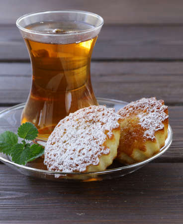 Turkish tea with a mini biscuits cupcakeの写真素材