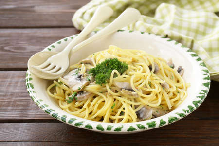 pasta carbonara with mushrooms, garlic and parsleyの写真素材