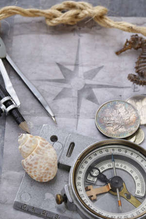 Vintage map and accessories for the treasure hunt and travelの写真素材
