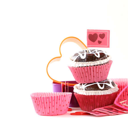 Festive pastry for Valentine's Day, chocolate muffin with red heartsの写真素材