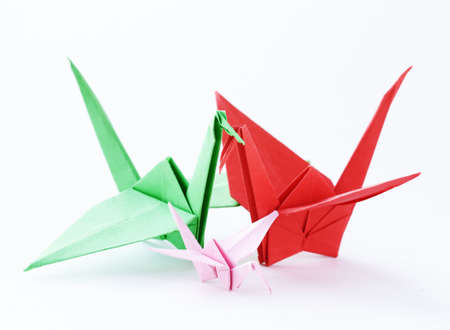 colorful paper origami birds on a white backgroundの写真素材