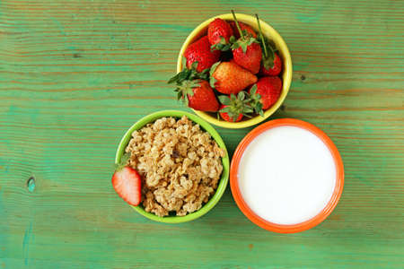 healthy breakfast of muesli, yoghurt, chia seeds, fruit and goji