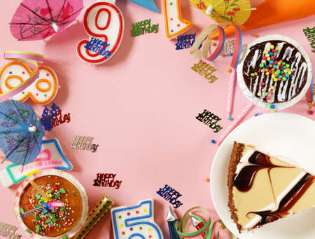 festive set for birthday party - candles, fireworks, dessertsの写真素材