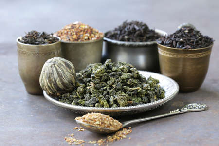 different varieties of dry tea (black, white, green)