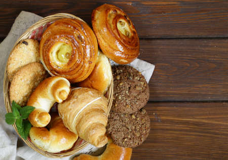 homemade baked buns  brioche, crescent rolls, croissants and biscuitsの写真素材