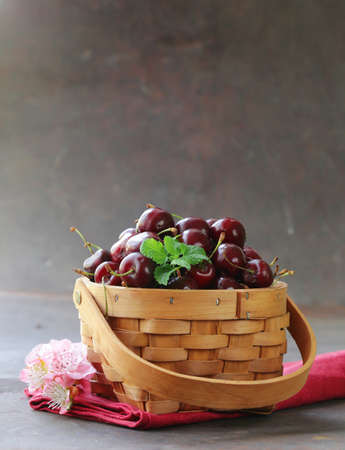 Natural organic berries cherries in a basket