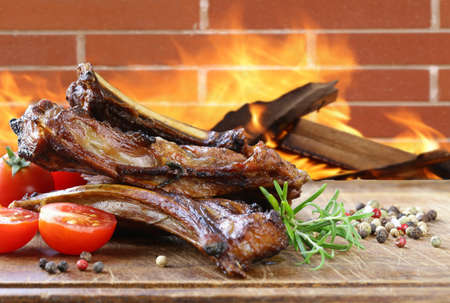 Grilled lamb chops steak with pepper and rosemaryの写真素材