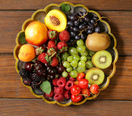 various fresh natural organic berries - cherry, raspberry, strawberry