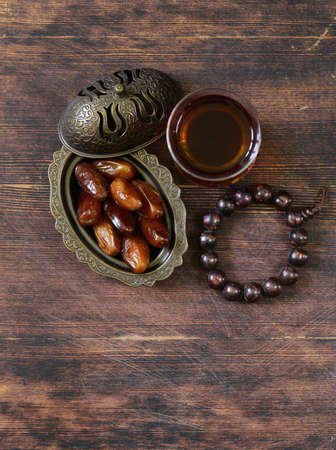 sweet dried dates in vintage silver plateの写真素材