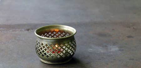 Arabic silver vintage lantern on an old iron backgroundの写真素材