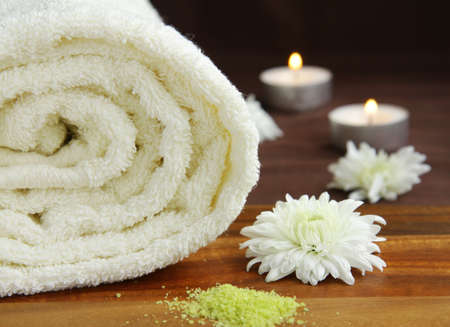 white towel, candles and flowers - spa conceptの写真素材