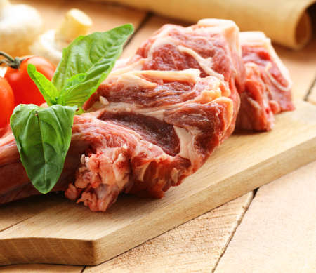 fresh raw red meat on wooden boardの写真素材