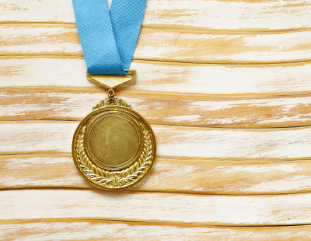 Gold medal with ribbon. The victory and the first place.の写真素材