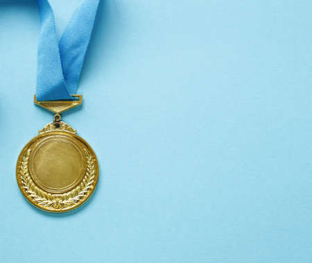 Gold medal with ribbon. The victory and the first place.の写真素材