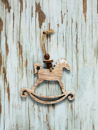 Christmas symbols and decorations on wooden backgroundの写真素材