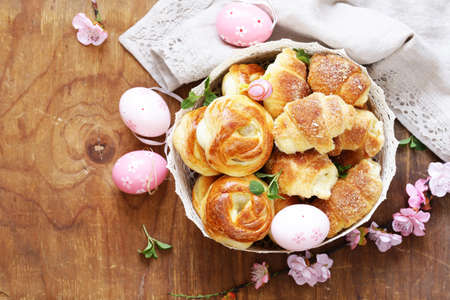Homemade pastries, muffins, sweet buns for Easter treatsの写真素材