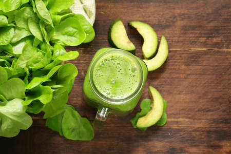 Fresh natural organic green smoothie with avocadoの写真素材